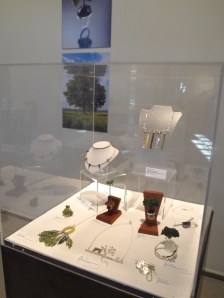 Among the media that Sarah Hood uses to create her jewelry is model railroad landscape materials. Image courtesy of Peninsula School of Art.